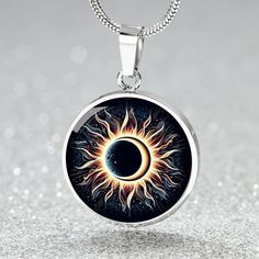 "Experience the celestial magic with our Personalized Total Solar Eclipse 2024 Pendant Necklace. Adorn yourself with the allure of the night sky through our Custom Lunar Eclipse Jewelry. Celebrate cosmic wonders with our Astronomy Skies Charm, capturing the essence of celestial beauty. Gift a cherished memory with our Engraved Jewelry, symbolizing the timeless allure of lunar eclipses. See other items from our Solar Eclipse Collection here: https://www.etsy.com/your/shops/RebelZebra/tools/listin Adjustable Magical Jewelry With Sun And Moon Design, Celestial Sun And Moon Jewelry, Celestial Jewelry With Sun And Moon Designs, Celestial Moon Phase Jewelry, Symbolic Round Necklace With Sun And Moon Design, Adjustable Magical Sun And Moon Jewelry, Adjustable Celestial Round Necklace, Celestial Circle Moon Phase Jewelry, Sun And Moon Design Circle Jewelry For Gift