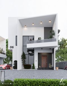 a white modern house with cars parked in the driveway