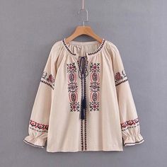 SPU:E58SH4J8117Sleeve Type:Long SleeveMaterial:Cotton-blendNeckline:V neckOccasion:Daily,CasualStyle:Casual,BohoTheme:Spring/Fall,SummerColor:Beige,Black,WhiteSize:One-sizeLength (cm):One-size:65Bust (cm):One-size:112Size ChartSizeLengthBustcminchcminchOne-size6525.611244.1 Linen Outfits, Linen Outfit, Tassel Blouse, Neck Flower, Straight Clothes, Outfit Chic, Bohemian Blouses, Outfits Chic, Folk Embroidery