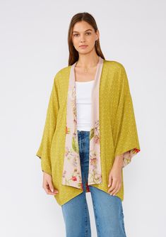 [Color: Rose/Green] Bohemian kimono in a pink floral print. Reversible cover up for the beach. Spring Printed Kimono For Loungewear, Spring Daywear Wrap Kimono, Spring Wrap Kimono For Daywear, Green Spring Kimono For Loungewear, Green Spring Loungewear Kimono, Green Kimono For Spring Loungewear, One Size Kimono For Layering In Spring, One Size Pink Kimono For Spring, Fall Layering Kimono With Kimono Sleeves