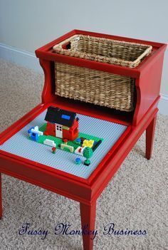 a red table with legos on it and the words diy lego table above it