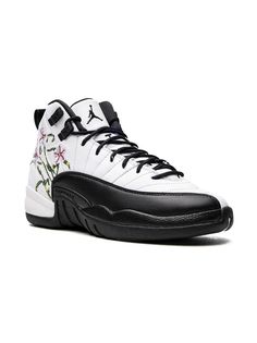 Jordan Kids Air Jordan 12 "Floral" sneakers Jordan Kids reimagines the classic Air Jordan 12 will floral embroidery here. In multicolour hues, this detailing adds a playful finish to the high-top pair. Black Sneakers With Boost Midsole For Spring, Black Boost Midsole Sneakers For Spring, Spring Black Sneakers With Boost Midsole, Custom Black Sneakers For Sports In Spring, High-top Sneakers With Embroidered Logo For Spring, Custom Black Sneakers For Spring Sports, Custom Black Sneakers With Rubber Sole For Spring, Custom Lace-up Sneakers With Embroidered Logo For Sports, Air Jordans Kid