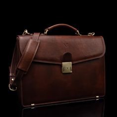 With unparalleled functionality in mind, we designed our No.1 Briefcase to be the perfect accompaniment to a style-conscious contemporary professional's everyday life. Inspired by the classics, the No.1 Briefcase is all about luxury and style that effortlessly finds its way into the modern day. Both smooth and sleek, this briefcase is expertly constructed in Northern Italy using only the finest premium Italian leather— certified full-grain vegetable-tanned cow leather. Fully lined with fine cott Classic Rectangular Cases For Business Trips, Timeless Formal Rectangular Case, Classic Cases For Everyday Use, Classic Rectangular Briefcase, Classic Rectangular Cases For Formal Use, Luxury Rectangular Cases For Work, Classic Rectangular Cases For Formal Occasions, Classic Leather Business Cases, Classic Rectangular Office Cases