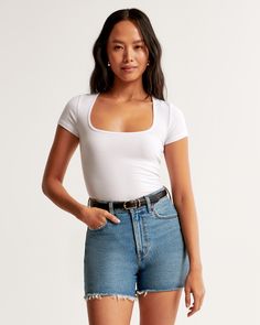 Elevate your wardrobe with the Abercrombie & Fitch Women's Featherweight Rib Tuckable Squareneck Top, a perfect blend of style and comfort. This top features:

- Size: XS
- Color: White
- Material: TENCEL™ Modal, Polyester
- Gender: Female
- Age Group: Adult

Designed for a slim fit, this short-sleeve top is crafted from a light, featherweight rib fabric that feels soft to the touch. The square neckline and all-over ribbed detail add a touch of elegance, while the straight hem allows for versati Classic Short Sleeve Top For Everyday Summer Wear, Classic Fitted Short Sleeve Top For Summer, Classic Short Sleeve Top For Summer, Classic Fitted Short Sleeve Top In Solid Color, Short Length Tops For Everyday Summer Wear, Short Length Summer Tops For Everyday, Classic Short Sleeve Top For Everyday Spring, Everyday Relaxed Fit Short Length Tops, Everyday Relaxed Fit Short Tops