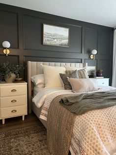 a large bed sitting next to a window in a bedroom