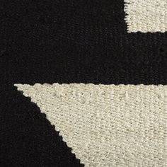 Handwoven from hand-loomed jute fibers, this area rug showcases an earthy texture and an angular broken stripes pattern in graphic black + ivory. It’s durable and non-absorbent enough to roll out in busy entryways and living rooms; we suggest adding a rug pad to hold it in place. AllModern Rug Size: Rectangle 8' x 10' Black;white Area Rug - AllModern Lemaster Geometric Handwoven Jute/Sisal Black/Gray/Ivory Area Rug in Black;white | Size Rectangle 8' x 10' Black White Area Rug, White Rectangle, Ivory Area Rug, White Area Rug, All Modern, Stripes Pattern, Rug Pad, Rug Size, Black Gray