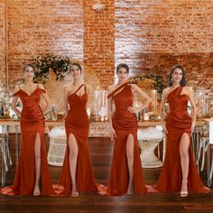 the bridesmaids are wearing red dresses with thigh high slits