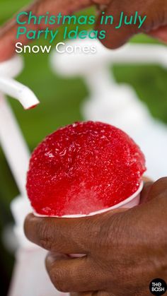 a person holding a bowl filled with snow cones and the words christmas in july party ideas