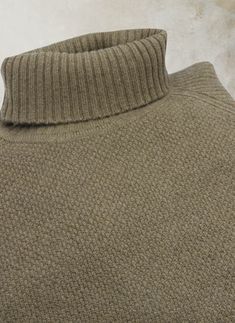 The Bolzano, our unique raglan-style turtleneck, from our signature buttery-soft, 2-ply Cashmere/Extrafine Merino yarn. The Bolzano is a pure, elevated "casual", and supremely elegant when worn with a 5-pocket pant or denims. From yarns twisted from Cashmere from Arbas goats from the Gobi and Altai regions of Mongolia, and Extra Fine Merino Wool from Australia, for maximum softness and luxurious feel. • 70% Ultrafine Merino Wool 30% Cashmere• Dry clean or hand wash, dry flat• Imported• Item # MG Beige Knit Turtleneck, Textured Merino Wool Funnel Neck Turtleneck, Merino Wool Textured Knit Funnel Neck Turtleneck, Wool Turtleneck With Funnel Neck, Beige Wool Turtleneck Top, Cozy Merino Wool Turtleneck Top, Wool Turtleneck Knit Top, Wool Turtleneck Top With Knit Fabrication, Wool Knit Turtleneck Top