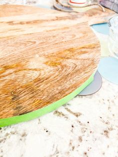 a close up of a cutting board on a table