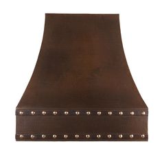 a brown leather range hood with rivets on the front and sides, against a white background