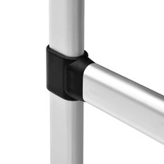 an image of a metal pole with two black bars on it's end and one white pole in the background