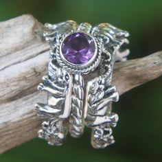 By Indonesian artisan Kadek Hendra this set of stacking rings is as majestic as it is beautiful. Handcrafted from sterling silver it features two band rings that depict herds of elephants surrounding an amethyst solitaire. Each ring in this set of three stands alone as its own beautiful piece when separated coming together to form a magnificent union. Intricate Amethyst Ring In Sterling Silver, Silver Filigree Amethyst Ring In Sterling Silver, Silver Multi-stone Amethyst Ring, Unique Hallmarked Sterling Silver Amethyst Ring, Sterling Silver Multi-stone Amethyst Ring, Pearl Cocktail Ring, Silver Swan, Sterling Silver Stacking Rings, Stacking Ring Set