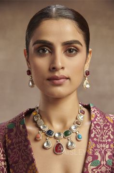 The navrattan polki necklace set is an ode to the Indian tradition and intricate work handcrafted by the artisans to celebrate a perfect armor between ancient and modern concepts. Indian Polki necklace in a melange of semi-precious stones is a beautiful work that takes a woman back to her roots. Inspired by Sabyasachi jewelry, our 22K gold plated necklace set is the most royal yet ravishing set that will leave everyone spellbound as you adorn it on your special day. Necklace Closure - Adjustable Navrattan Set, Victorian Polki Jewellery, Timeless Jewellery, Polki Necklace Set, Sabyasachi Jewelry, Sabyasachi Jewellery, Necklace Set Indian, Polki Earrings, Polki Necklace