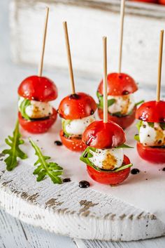 small appetizers with tomatoes and mozzarella cheese