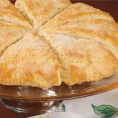 a pie sitting in a white dish on top of a stove