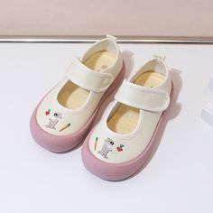 These adorable Mary Jane shoes feature an adorable cartoon design with a touch fastener strap. They offer arch support and have a soft heel insole for added comfort. Upper Material: CanvasOutsole Material: RubberLining Material: CanvasInsole Material: PU Suggested Age US Size EU Size FootLength Inch cm 2T 6 22 5.5 13.9 2T 7 23 5.7 14.4 2.5T 8 24 5.9 14.9 3T 9 25 6.1 15.4 3.5T 9.5 26 6.3 15.9 4T 10 27 6.5 16.4 5T 11 28 6.6 16.9 5T 11.5 29 6.8 17.4 5.5T 12.5 30 7 17.9 6T 13 31 7.2 18.4 6.5T 1 32 7 Cute Mary Janes With Rubber Sole And Round Toe, White Non-slip Canvas Shoes With Round Toe, Non-slip Canvas Shoes With Round Toe For Summer, Non-slip Summer Canvas Shoes With Round Toe, Playful Non-slip Closed Toe Sneakers, Casual White Mary Janes With Round Toe, Spring Canvas Shoes With Soft Sole And Round Toe, White Non-slip Mary Janes With Round Toe, Casual Mary Janes With Soft Sole And Round Toe