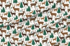 a white background with deer and trees on it