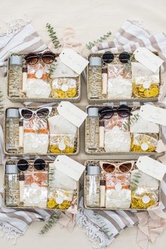 six glass jars with sunglasses and labels on them