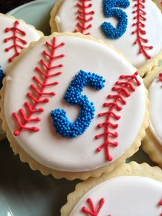 decorated cookies with red, white and blue frosting are arranged on a platter