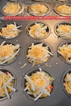 a muffin tin filled with cupcakes covered in cheese