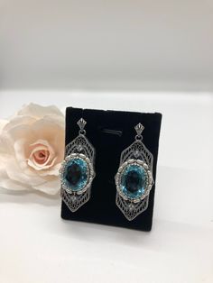 Excited to share the latest addition to my #etsy shop: Simulated Aquamarine Gemstone Art Deco Sterling Silver and Pearl Filigree Drop Earrings {Made To Order} https://etsy.me/2qZezuR #jewelry #earrings #silver #artdeco #earwire #yes #girls #aquamarine #no Oval Filigree Earrings For Wedding, Sterling Silver Blue Earrings With Intricate Design, Blue Sterling Silver Earrings With Intricate Design, Blue Oval Earrings For Evening, Art Deco Blue Drop Earrings, Blue Art Deco Wedding Earrings, Ornate Blue Pierced Earrings, Blue Victorian Earrings For Wedding, Victorian Blue Earrings For Weddings