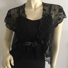 Dana Buchanan Black Short Sleeved Shrug Fully Embellished With Beaded Flowers And Trim. Size Large. New With Tags. Picture With Envelope In The Back Shows One Sequin Missing. Beautiful Shrug To Dress Up Slip Dresses Or Camis. Please Do Not Use My Photos Without Permission Black Shrug For Dresses, Hoco 2024, Black Shrug, Shrug For Dresses, Slip Dresses, Black Stockings, Beaded Flowers, Black Shorts, Sequin