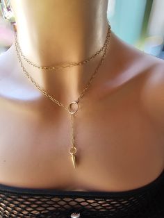 This is a dainty minimalist 24k Gold Filled steel Lariat Necklace Set wrap gothic grunge punk aesthetic choker with Spike pendant.  The minimalist design gives it a trendy and stylish feel, while it has a touch of gothic Punk edge.   This necklace is versatile and can be worn long or doubled up for a layered look. This is a dainty chain, but is strong steel. if you are looking for someone more suitable to "fun and games" please take a look in my shop for more sturdy versions 😉 Approximately 35" Grunge Punk Aesthetic, Aesthetic Choker, Punk Aesthetic, Dainty Choker, Gothic Grunge, Wrap Necklace, Wrap Necklaces, Punk Grunge, Dainty Chain