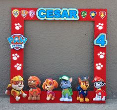 a red frame with paw patrol pictures on it