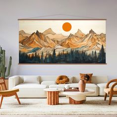 a living room filled with furniture and a painting on the wall above it's couch