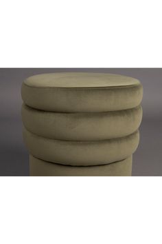 three round stools stacked on top of each other