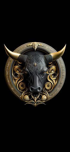 a bull's head with golden horns on a black background