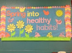 a bulletin board that says spring into healthy habitats