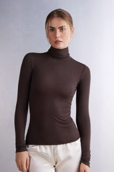 Modal Cashmere Ultralight High-Neck Top - Intimissimi Versatile Second-skin Fit Top, Brown Fine Knit Turtleneck Top, Solid Turtleneck With Thumbholes For Layering, Versatile Stretch Turtleneck For Layering, Brown Stretch Turtleneck Tops, High Stretch Seamless High Neck Top, High Neck Seamless Stretch Top, High Neck Seamless High Stretch Top, Versatile High Stretch Turtleneck