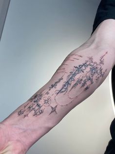 a person with a tattoo on their arm