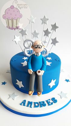 a birthday cake with an image of a man sitting on top and stars around it