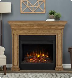 a living room with a fireplace and chair