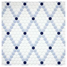 a blue and white tile pattern with hexagonal shapes on it's surface