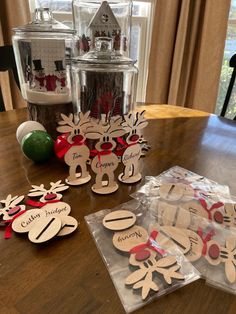 the table is covered with christmas decorations and paper cutouts for santa's sleigh