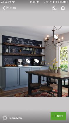 the kitchen is clean and ready to be used for dinner or coffee break, with chalkboard menus on the wall