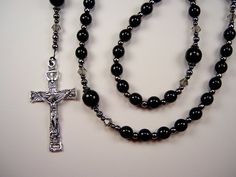 "Great Gift!! This Beautiful Rosary is handcrafted with 6mm and  8mm Black Czech Glass Pearl Beads.  Genuine Czech Glass Pearl Beads.  The Rosary is 20\" from top  of the Loop to bottom of Cross.  ( Laid flat )  ALL BLACK CONSTRUCTION WITH Gunmetal Black Beads and Findings. 4mm Crystal Steel Czech Glass Bicone Beads Holy Spirit Crucifix  This Beautiful Crucifix Features an Image of The Holy Spirit Above The Cross.  It is 1 3/4\" long, Made in Italy with a Silver Oxidized Finish. Sacred Heart / S Bead Rosary, Our Lady Of Sorrows, Rosary Catholic, Beading Wire, Sacred Heart, Black Pearl, Our Lady, Czech Glass Beads, Black Beads