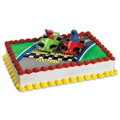 a birthday cake with an image of a race car on it