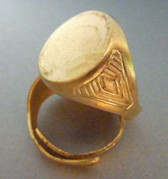 Solid thick raw brass ring, pretty matte gold color. Art deco design along the sides. Adjustable size, but on the bigger side. It wouldn't work for a small ring size. The back can be cut and soldered for permanent sizing. Probably best as a setting for a men's signet ring. 15 mm diameter top. One per listing. Vintage Instagram, Small Gold Hoops, Layered Rings, Tiny Hoop Earrings, Signet Ring Men, Mini Hoop Earrings, Top Art, Round Top, Small Rings