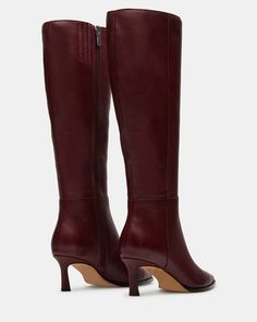 Elevate your style with LUCID - a sleek, knee-high boot featuring a trendy kitten heel and a pointed toe for a sophisticated touch. Perfect for pairing with any outfit, this boot will add a touch of elegance to your wardrobe. 2.25 inch heel height Size 6 measurements: 14.5 inch shaft circumference, 15.25 inch shaft hei Wine Boots Outfit, Red Knee High Boots Outfit, Burgundy Boots Outfit, Bordeaux Boots, Red Knee High Boots, Leather Boots Outfit, Red Boots Women, Knee Boots Outfit, Burgundy Boots