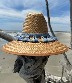 Drawstring Adjustable Fringe Hats, Adjustable Light Blue Sun Hat For The Beach, Adjustable Light Blue Sun Hat For Beach, Casual Adjustable Sun Hat With Fringe, Adjustable Fringe Hat With Curved Brim, Adjustable Sun Hat With Fringe And Curved Brim, Adjustable Fringe Sun Hat With Curved Brim, Adjustable Coastal Straw Hat For Festivals, Adjustable Curved Brim Sun Hat With Fringe