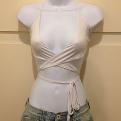 This Top Wraps Around Ties In The Front And Is Very Sexy. I Don't Remember If It Came With A Tag Or Not Since It Was Originally Bought Online (If It Did, Then The Tag Will Still Be Attached) But It Was Never Worn. Cross-tied Backless Halter Top For Summer, Summer Low-cut Crop Top With Built-in Bra, Crop Top Diy Ideas, Low-cut Tops For Summer Night Out, Spring Club Halter Top With Built-in Bra, Fitted Strappy Cross-tied Crop Top, Summer Club Halter Top With Built-in Bra, Beachwear Triangle Halter Top For Night Out, Strappy Cross-tied Fitted Crop Top