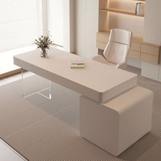 an office desk with a white chair and flower vase on the table in front of it