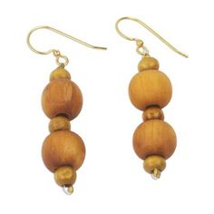 Rustic yet classy this pair of beaded dangle earrings crafted from sese wood is the perfect accessory for any day. Rita Addo Zakour designs each earring with beaded pattern that alternates between large and small spheres in brown. Affordable Brown Dangling Bead Earrings, Novica Jewelry, Brown Clothing, Brown Jewelry, Wood Bead Necklace, Earrings Beaded, Jewelry Earring, Earring Crafts, Beaded Dangle Earrings