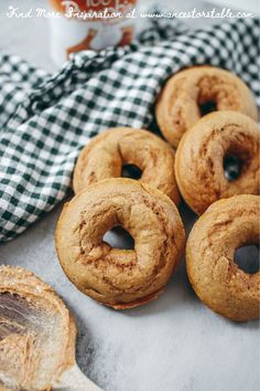 some cinnamon donuts are on a table