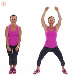 a woman in pink shirt and black leggings doing exercises with her hands up